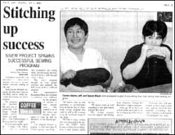 Page of a newspaper including a photograph of two females and with the main article heading of Stitching up success