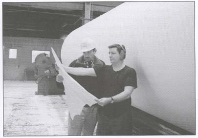 Two men looking at a chart