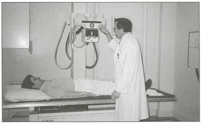 picture of a medical personal examining a patient