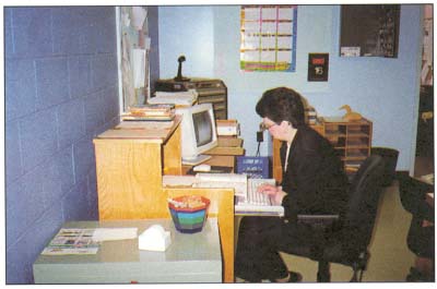  picture of a woman working on a computer