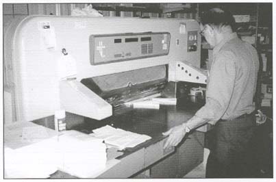 picture of a man working at a work station