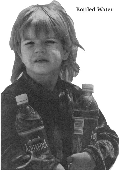 A girl with two bottles of water in her arms