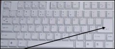 Keyboard with an arrow pointing to the Enter button