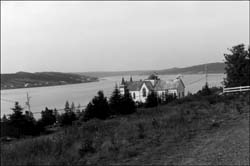 photo of a house on a shoreline