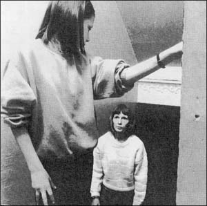 Girl being followed by another girl