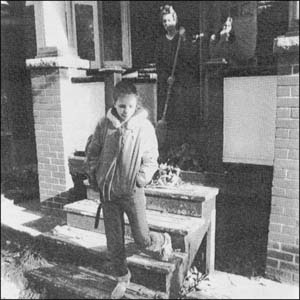 Girl walking away from house