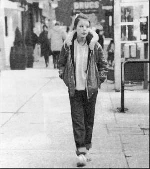 Girl walking along the street