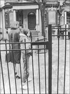 Girl being taken into a foster home