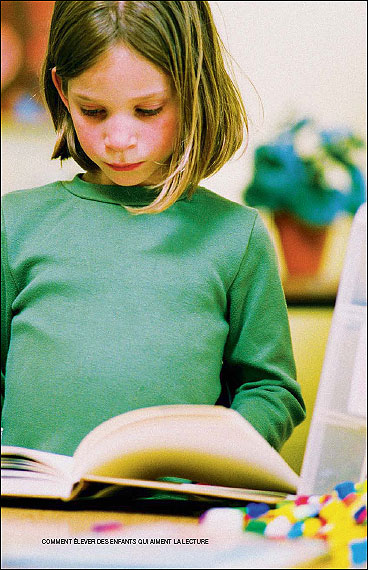 little girl reading a book