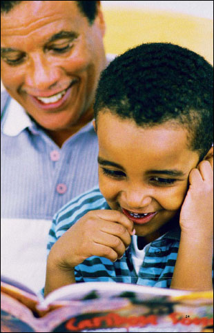 father reading with his child