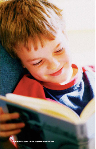 little boy reading a book