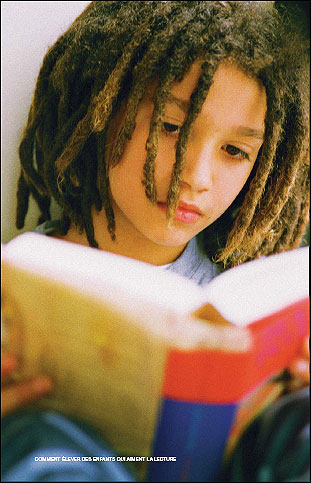 little boy reading a book