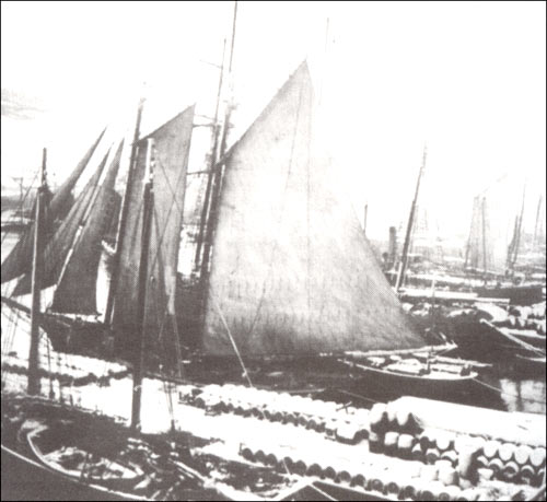 photo of sailing ships dockside