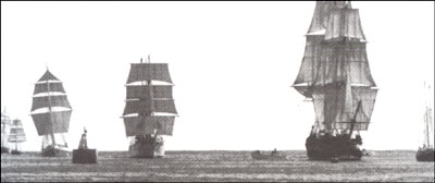 photo of several saiing ships