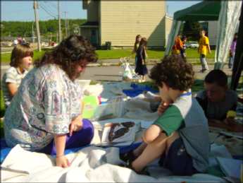 Adult with children in an outdoor setting