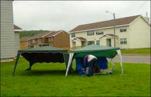 Two erected tent canopies