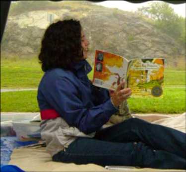 Woman reading from a book