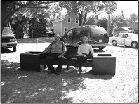 a couple sitting on a bench