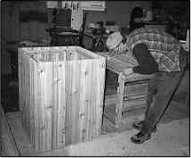 a man doing some wood work