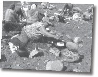 A man building a camp site