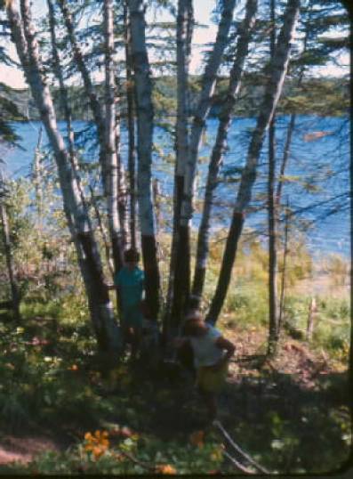 graphic of a photo of a mother and daughter standing by a river.