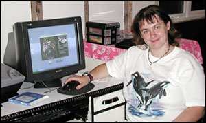 photo of Donna Woodard and her new computer system from Canada Post