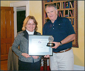 photo of Brigid Hayes receiving the NALD Award