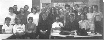 Graphic: a photograph of the 27 teachers in the E-6602 Curriculum Studies class