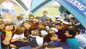 children at used book sale