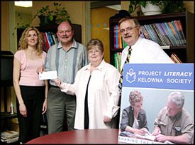 photo of Central Okanagan Foundation presenting a cheque to Project Literacy