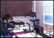 a woman working at a desk