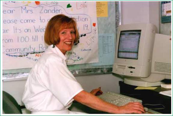 Woman using a computer.