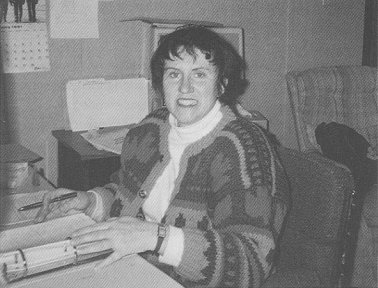 Joanne working at her desk