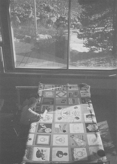 Pat and Deborah working on a quilt
