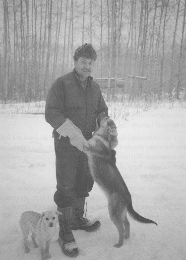 Klaus outside with his dogs