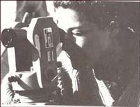 Women with survey instrument